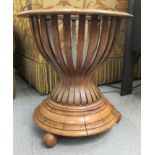 A 19thC mahogany aspidistra pot stand of waisted, slatted design,