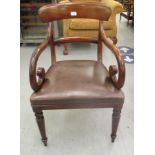 A late Regency mahogany framed, curved bar back elbow chair, the mushroom coloured,