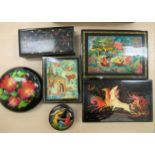 Three various Russian black lacquered papier mache boxes,