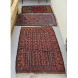 Three dissimilar Persian rugs,