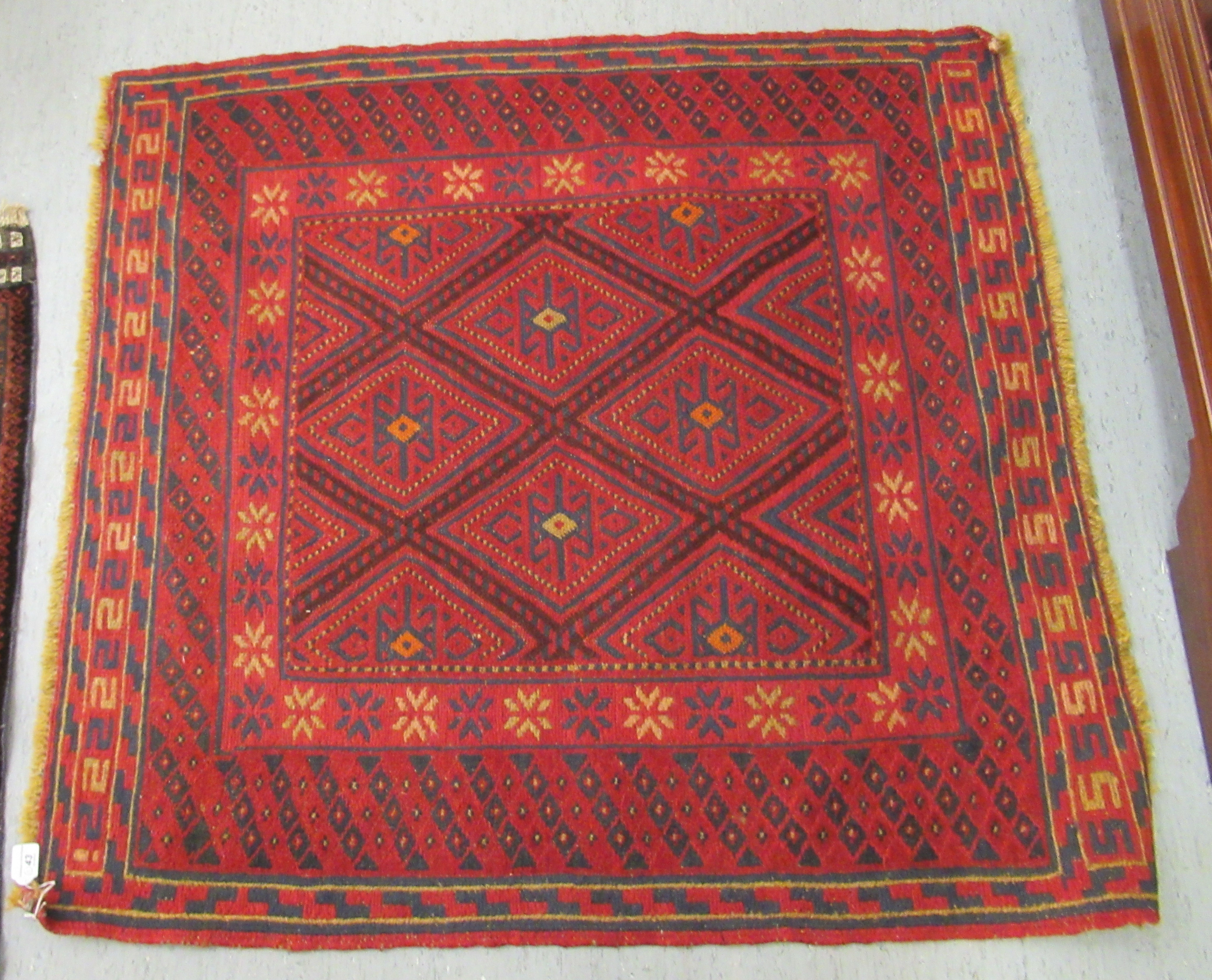 Two woollen Persian rugs, decorated in stylised designs, - Image 2 of 5