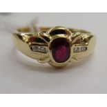 An 18ct gold ring, set with a ruby,