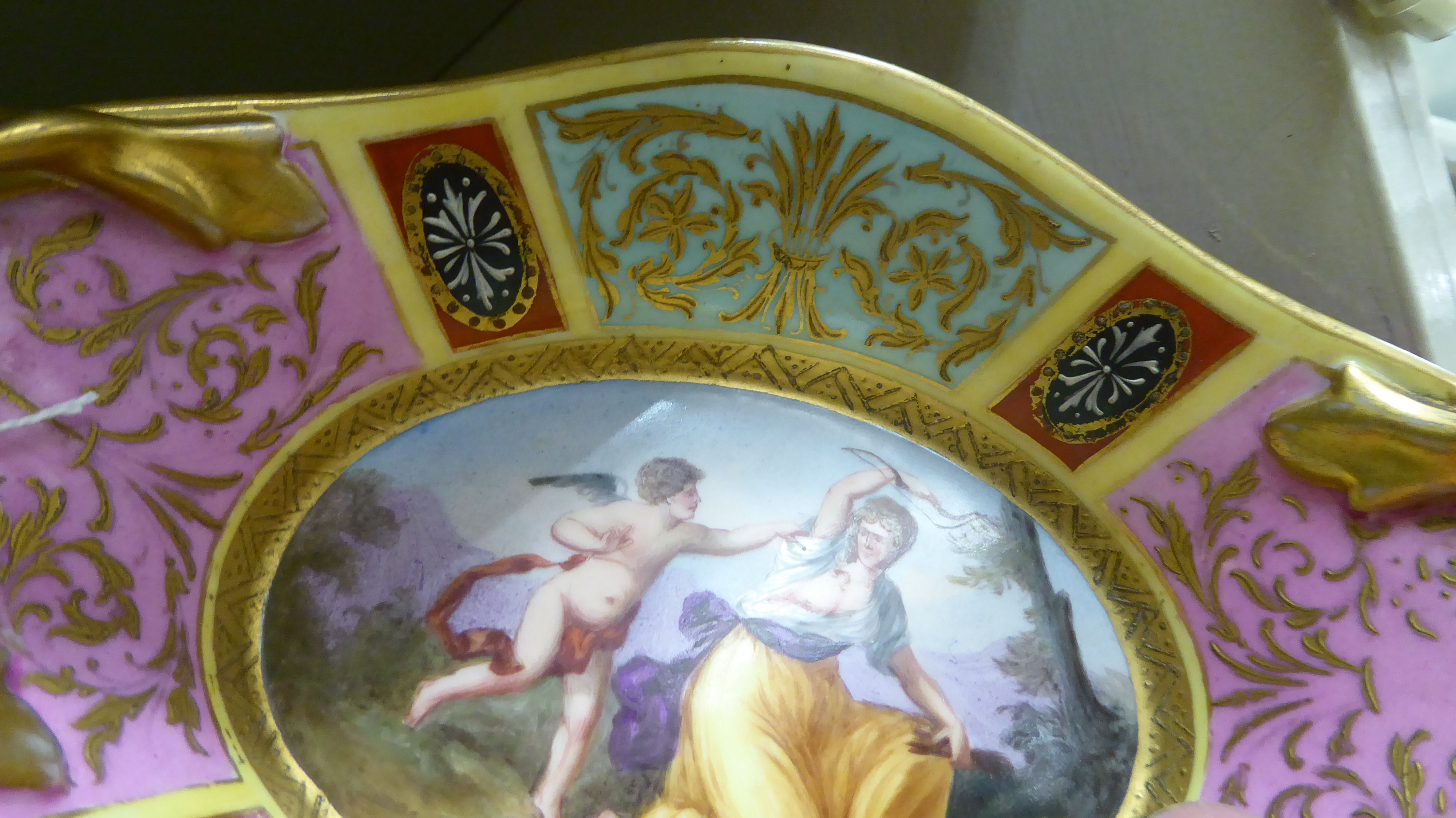 A late 19thC Vienna porcelain shallow dish with a gilded opposing ropetwist design handles, - Image 4 of 5