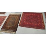 Two woollen Persian rugs, decorated in stylised designs,