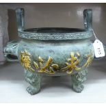 An Oriental cast and patinated green and part gilded bronze censer,