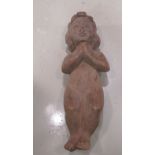 An early 20thC carved wooden papier mache mould for a praying cherubic figure 12''h OS6