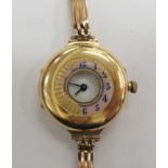 An Edwardian lady's 18ct gold cased half hunter wristwatch,