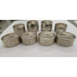 Eight various silver napkin rings,