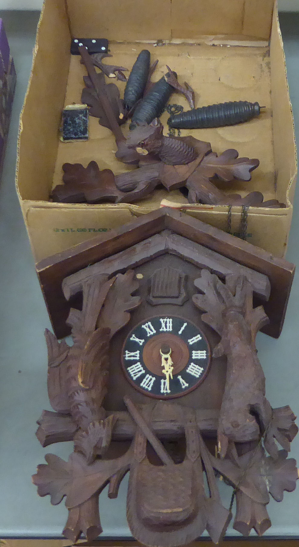 A mid 20thC carved Black Forest cuckoo clock,