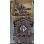 A mid 20thC carved Black Forest cuckoo clock,