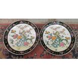 A pair of 20thC Chinese porcelain chargers, decorated with exotic birds and flora 15.