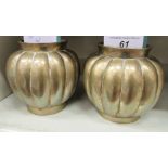 A pair of Oriental cast bronze vases of reed moulded bulbous form bearing seal marks 3.