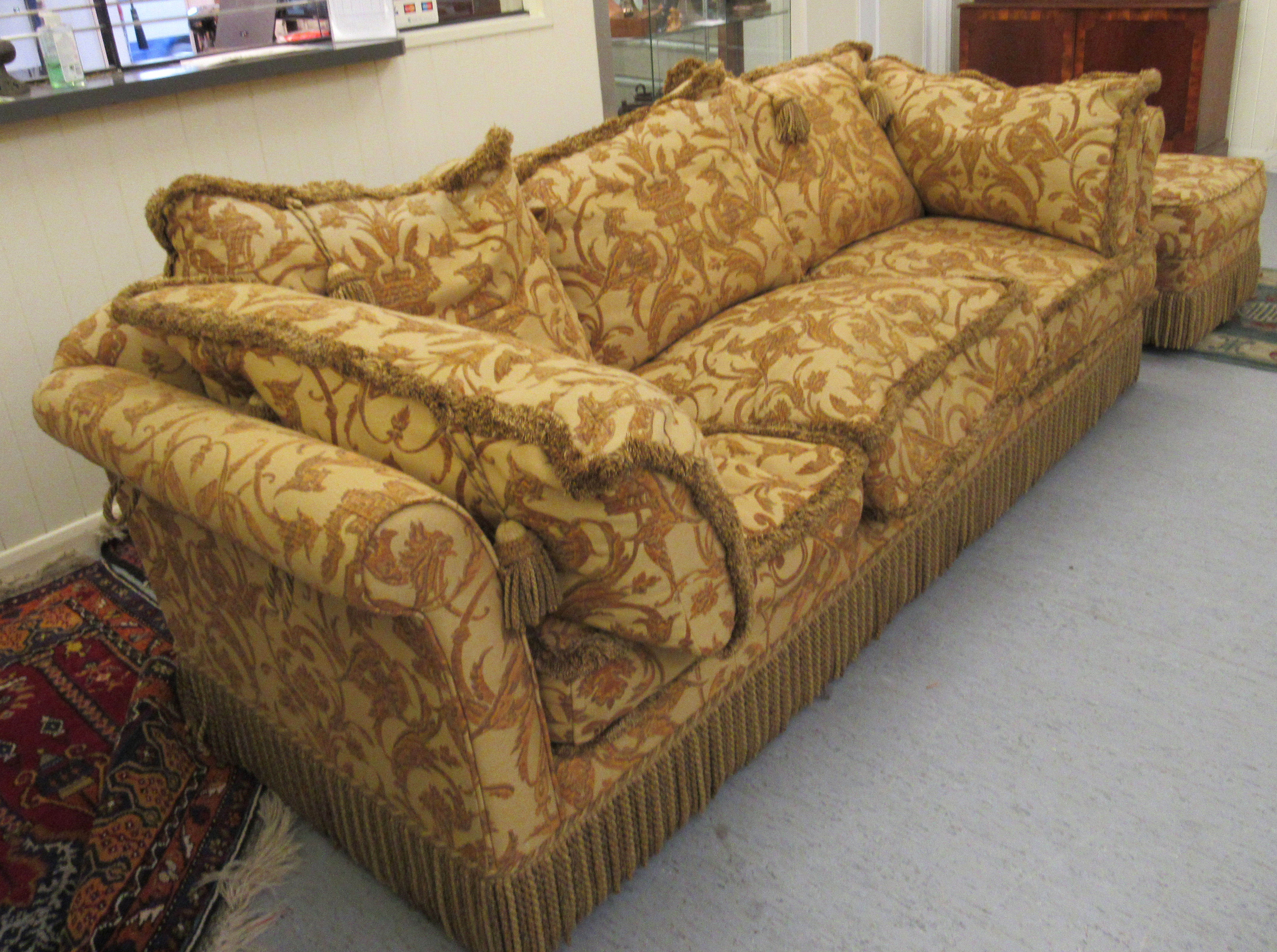 A modern three person settee with a low back and level, scrolled arms, - Image 3 of 3