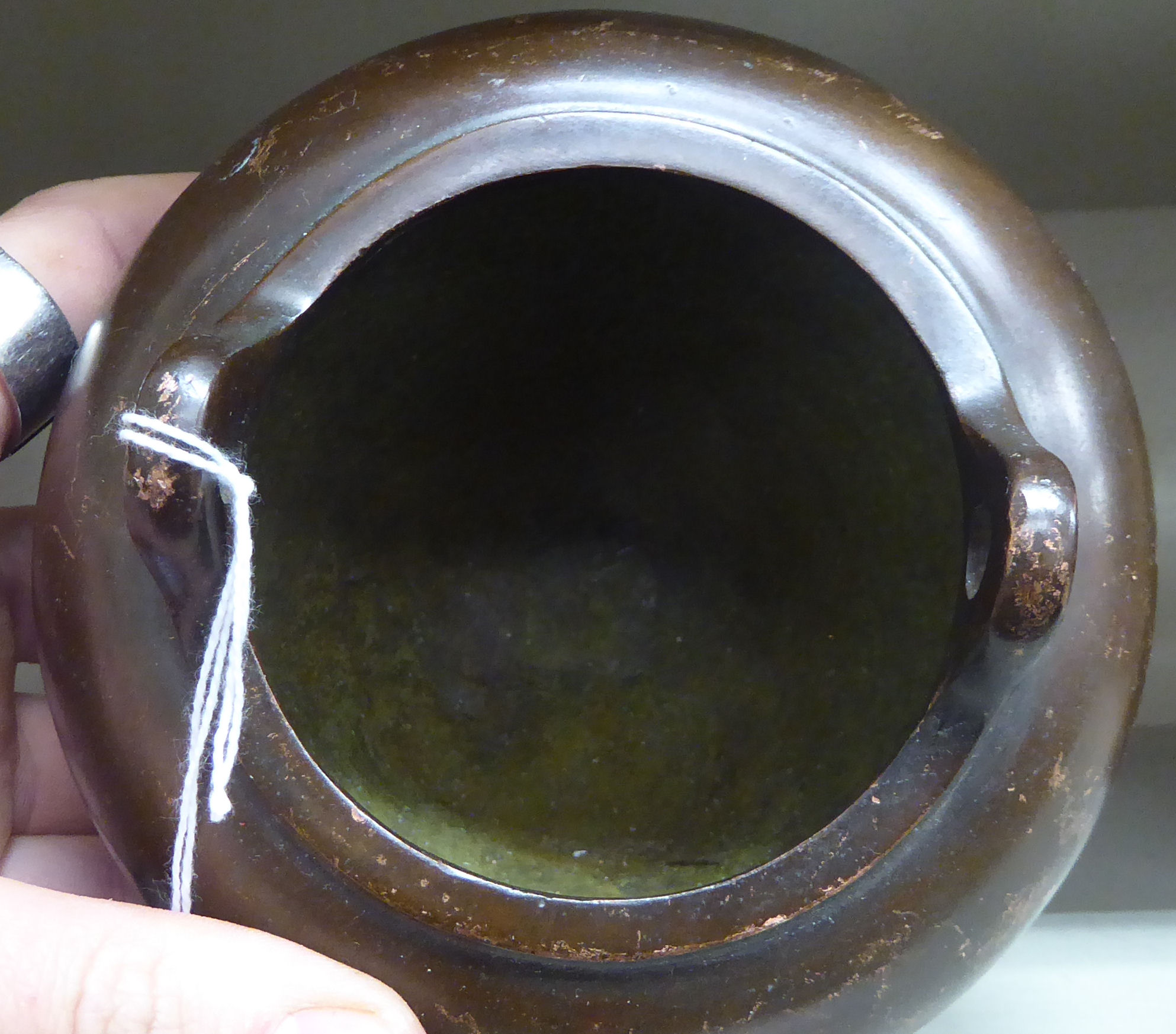 An Oriental cast and patinated bronze censer, the tapered, bulbous bowl with opposing, - Image 3 of 4