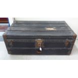 An early 20thC canvas bound trunk with wooden strapping 14''h 36''w 20''deep SR