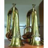 Two brass bugles,