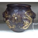 An Oriental cast and patinated and gilded bronze censer,