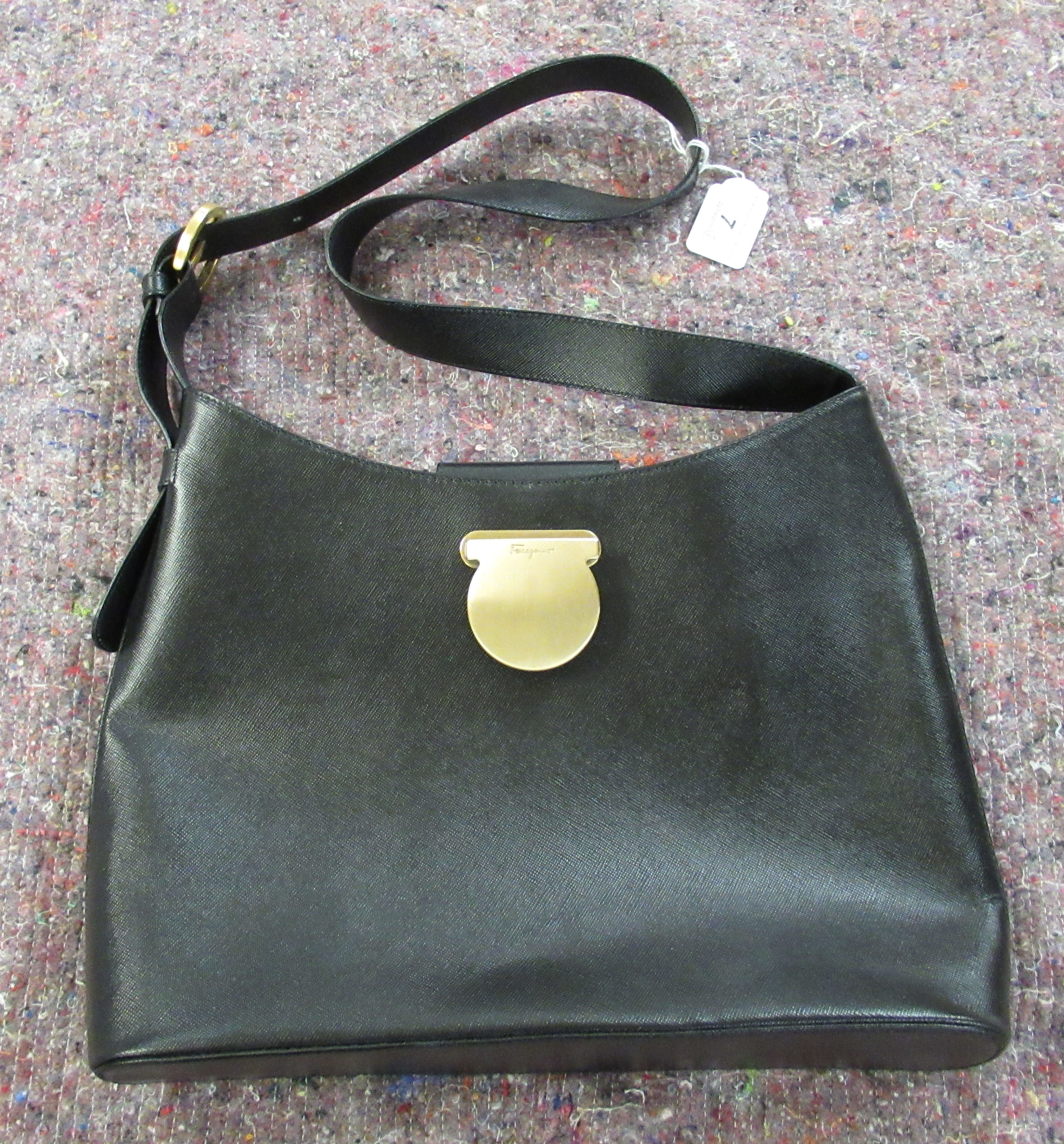 A Salvatore Ferragamo black leather tote bag OS6