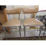 Two 1960s/70s cast metal framed side chairs,