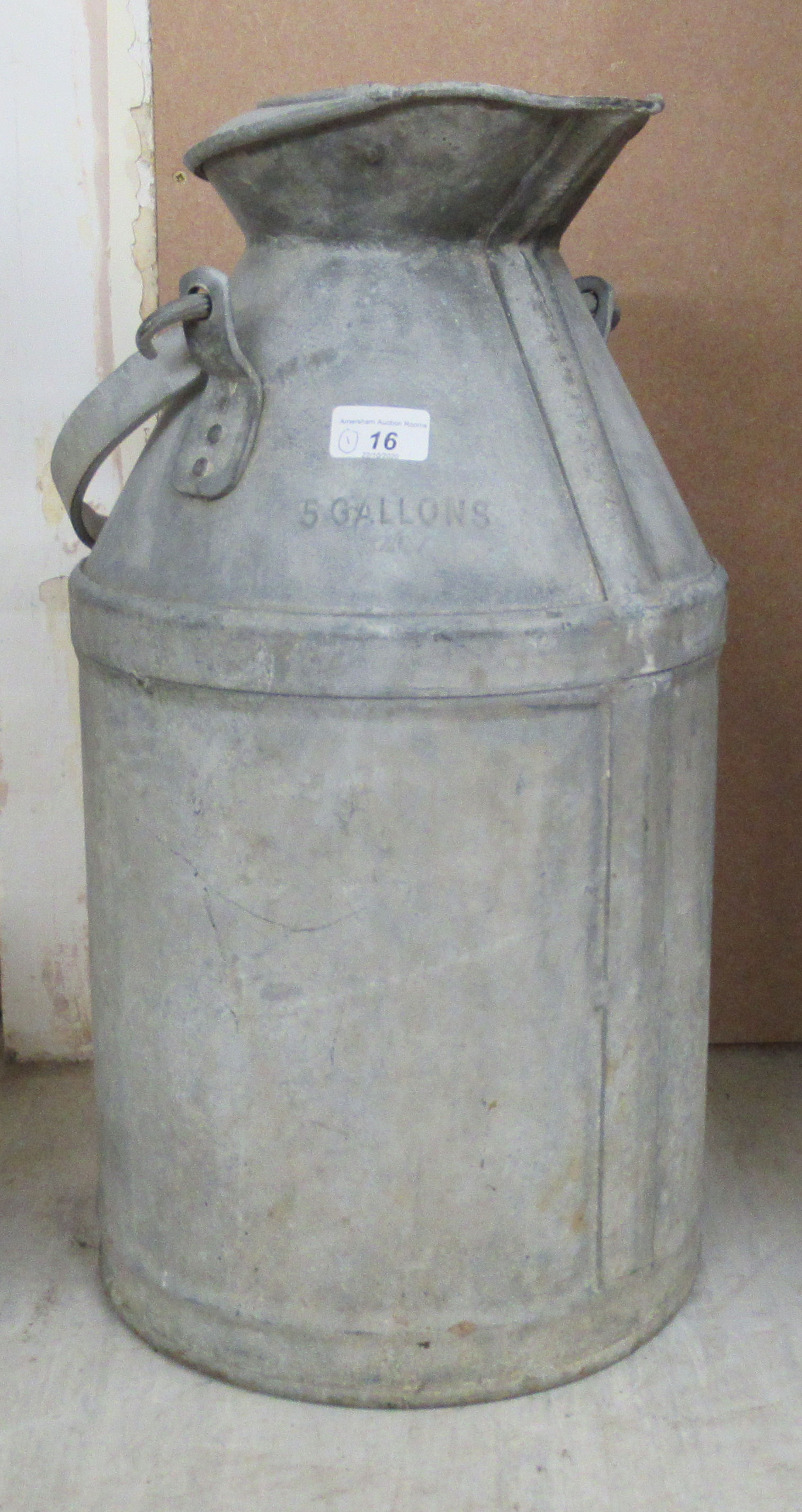 A 'vintage' 5 gallon galvanised iron milk churn,