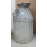 A 'vintage' 5 gallon galvanised iron milk churn,