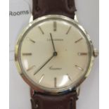 A 1960s Longines Cosmo SM 438, stainless steel cased wristwatch, faced by a baton dial,