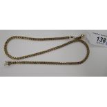 A 9ct yellow and rose gold fancy link chain 11