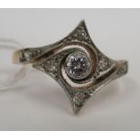An 18ct gold and platinum starburst diamond ring 11