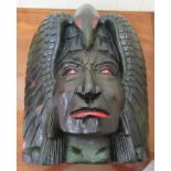 A 20thC carved and painted wooden bust of an American Indian 20''h CA