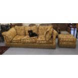 A Parker & Farr three person settee, upholstered in classically patterned,