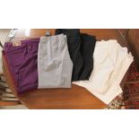 Eight pairs of ladies trousers: to include examples by Escada,