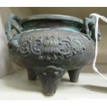 An Oriental cast bronze censer,