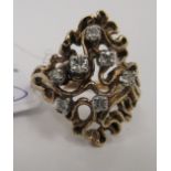 A yellow metal Art Nouveau design ring,