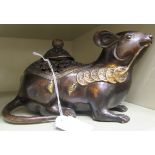 An Oriental cast and patinated and part gilded censer and cover, fashioned as a seated rodent,