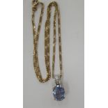 An 18ct white and yellow gold sapphire pendant approx.size 12.5 x 10 x 5.