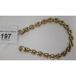 A 9ct gold alternating bar link bracelet 11