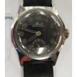 A 1940s Mido Multifor stainless steel cased wristwatch, faced by a black dimmer Arabic dial,