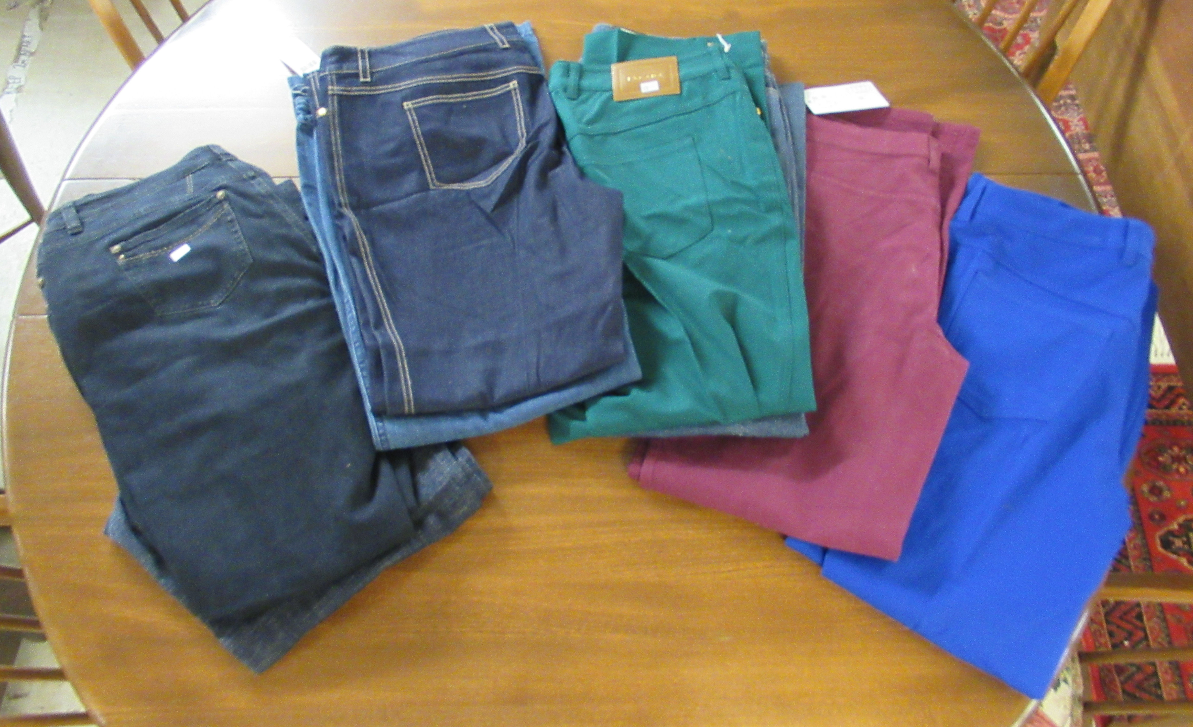 Eight pairs of ladies trousers and jeans: to include examples by Louis Feraud,