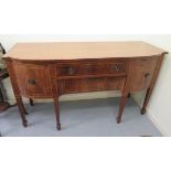 A late 19thC Georgian design satinwood inlaid mahogany breakfront sideboard,