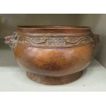 An Oriental cast and patinated bronze censer,