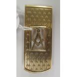 A 9ct gold money clip with a pierced Masonic logo 11