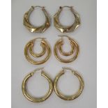 Three pairs of 9ct gold fancy hoop design earrings 11