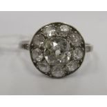 An early 20thC platinum cluster diamond ring,