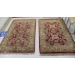 A pair of Persian rugs,