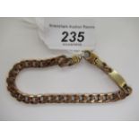 A 9ct gold flat curb link bracelet 11