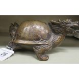 An Oriental cast bronze model,