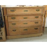 A late 19thC waxed pine dressing chest, the four long drawers with iron bail handles,