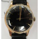 A 1950s Smiths gold plated and stainless steel cased wristwatch, the movement with sweeping seconds,
