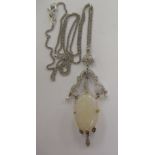 An 18ct white gold opal and diamond pendant necklace,