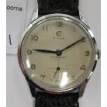 A 1950s Cyma Cymaflex Watersport stainless steel cased wristwatch, faced by an Arabic dial,